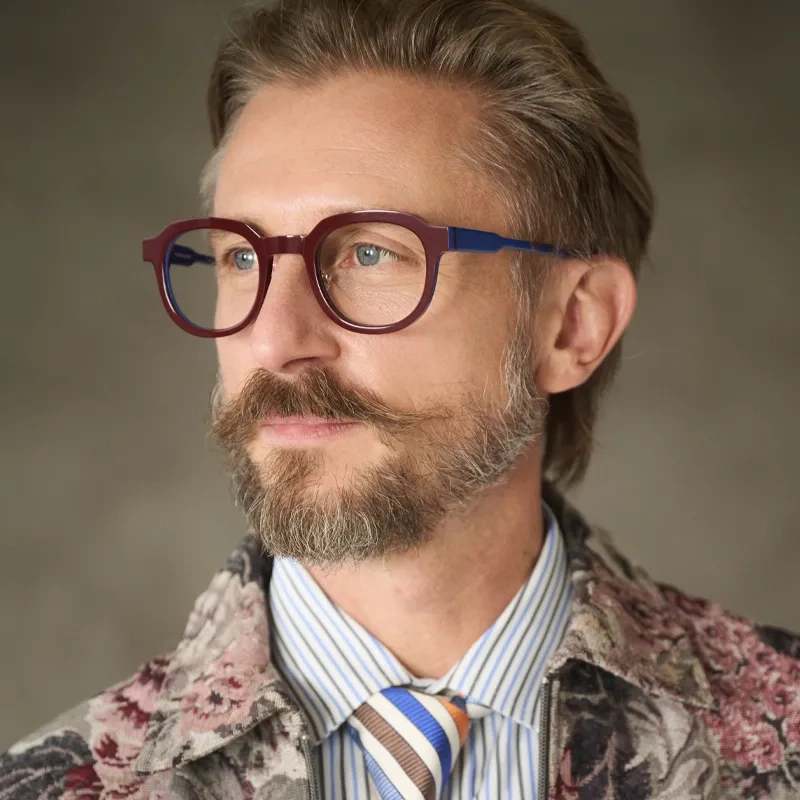 Röd och blå acetatbåge från KunoQvist